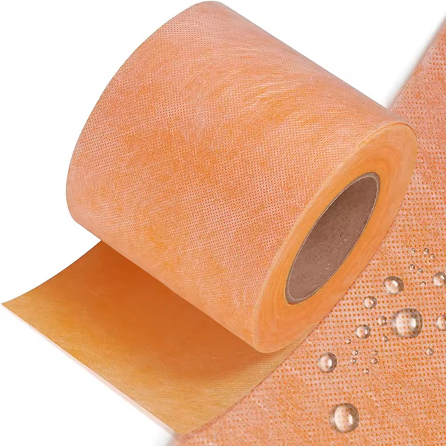 Water droplets on orange tile shower waterproofing membrane surface