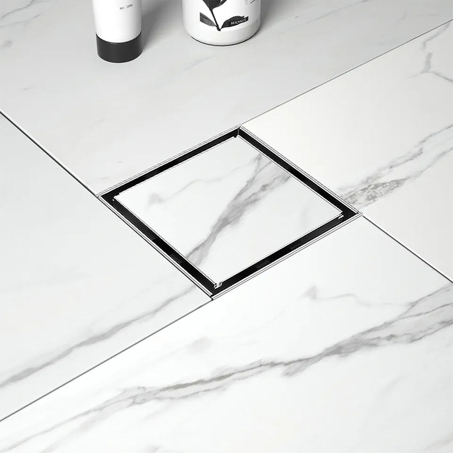 Square shower floor drain tile finish with flanged drain edge