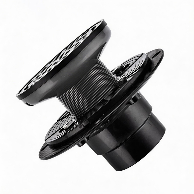 Complete black round shower floor drain assembly featuring adjustable PVC base