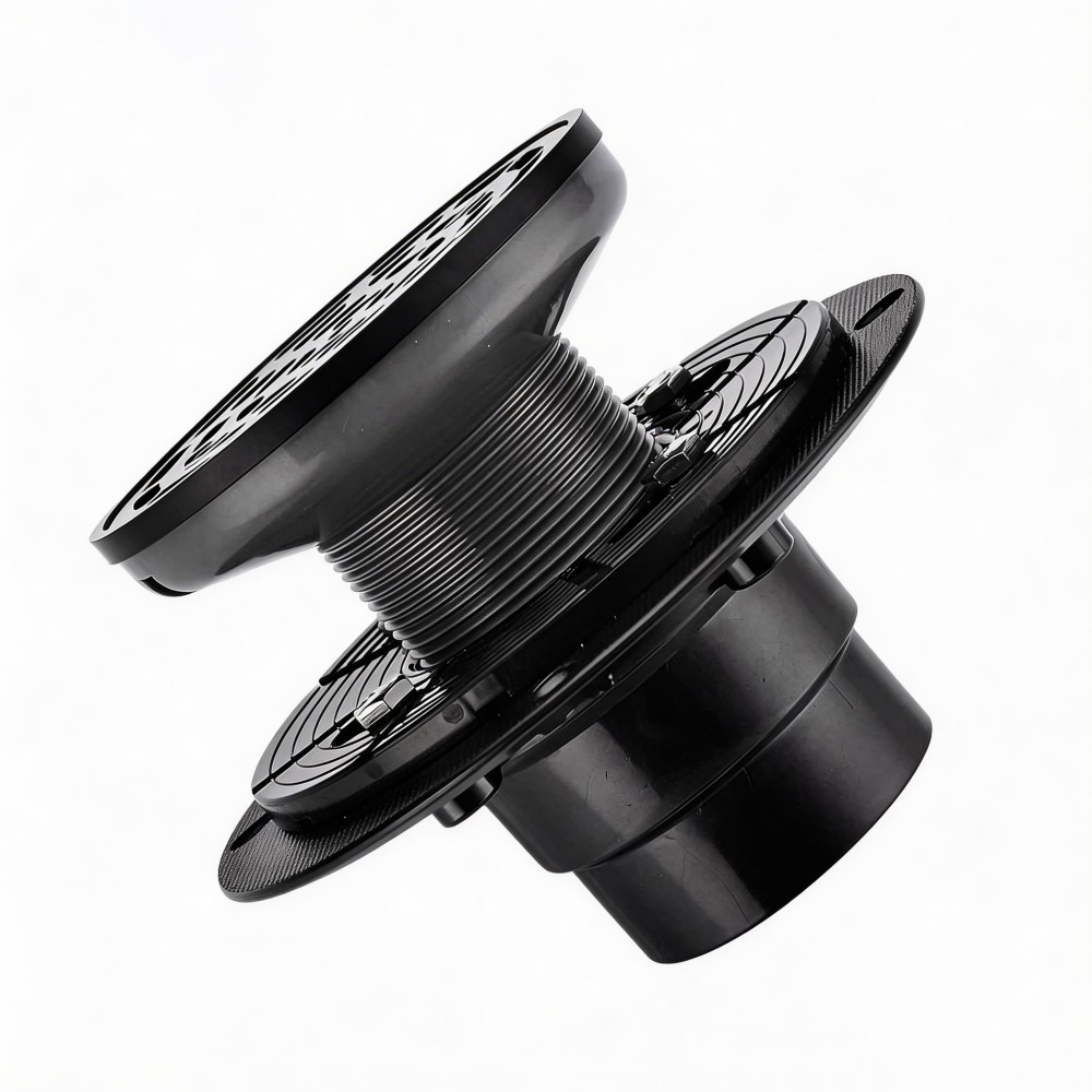 Complete black round shower floor drain assembly featuring adjustable PVC base