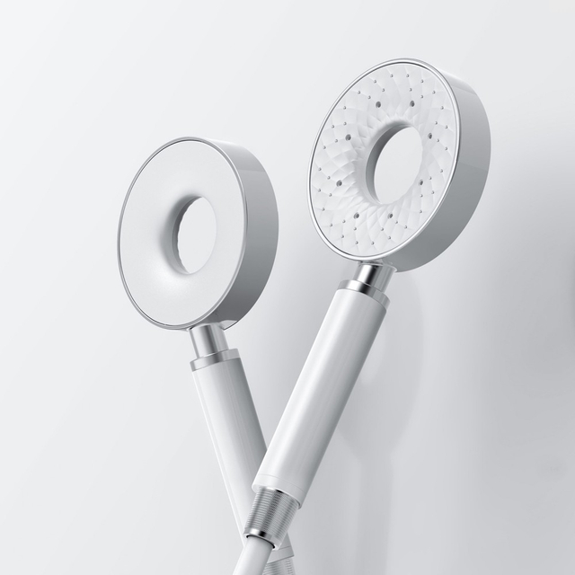 Modern handheld shower head detail with fine spray nozzles