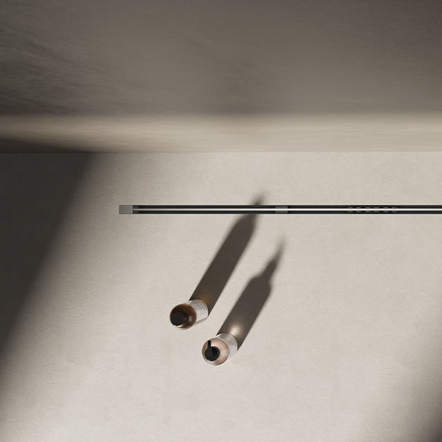 Modern minimalist bathroom floor featuring a cuttable linear shower drain black with a slim line design