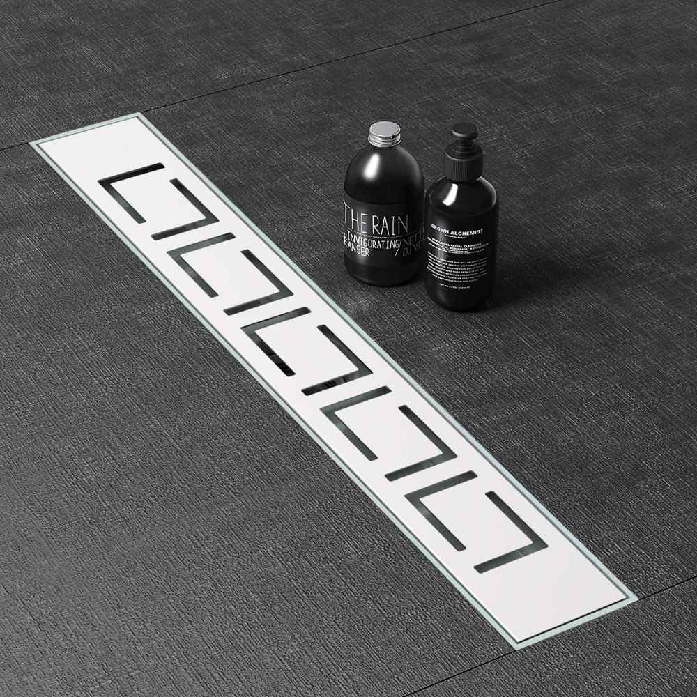 Modern dark tile bathroom flooring featuring installed anti clog drain with minimalist design