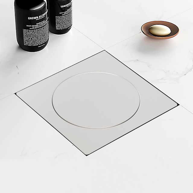 Modern square shower drain for tile floor in minimalist bathroom