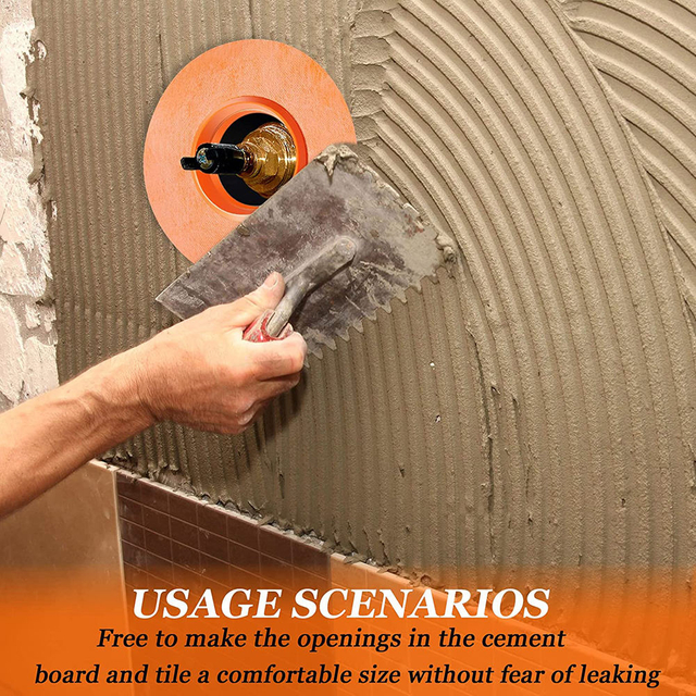 Applying thin-set mortar over a waterproofing mixing valve seal on a shower wall
