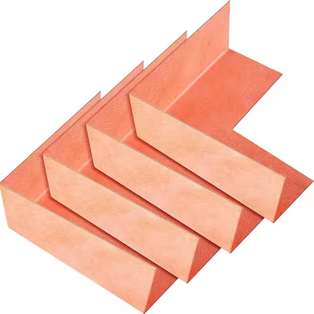 Stack of orange seamless waterproofing polyethylene inside corners ready for shower installation