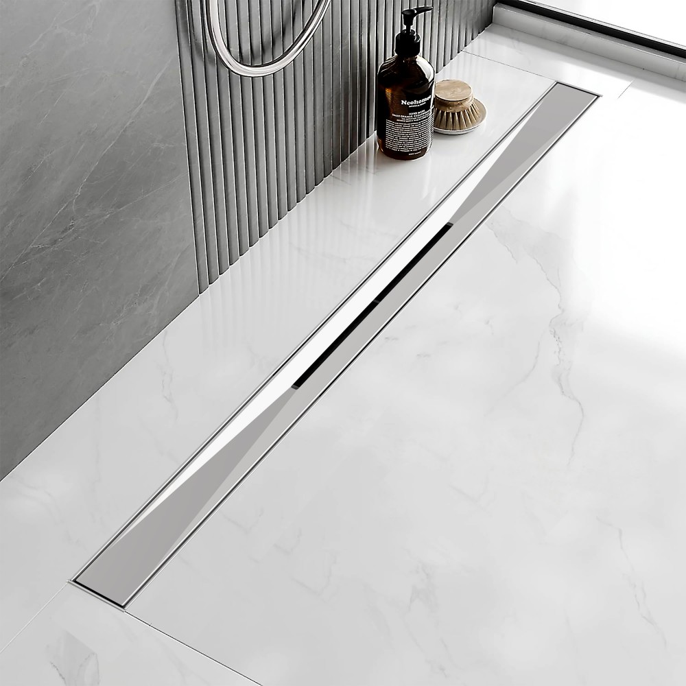 Stainless steel linear shower floor drain used in modern bathroom flooring