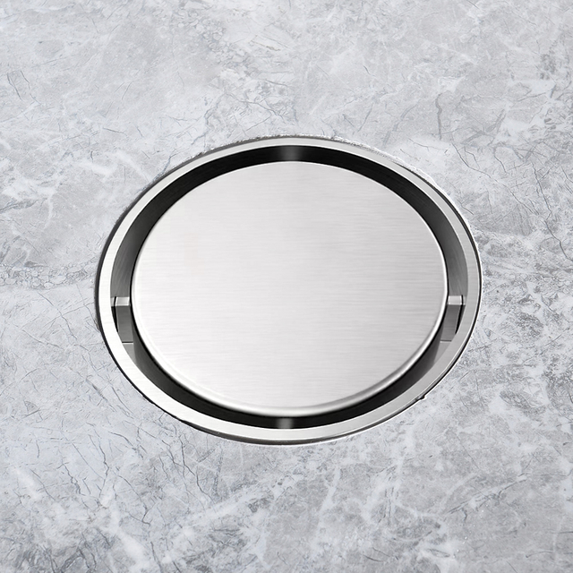 Floor drain round stainless steel shower drain installed in tile floor