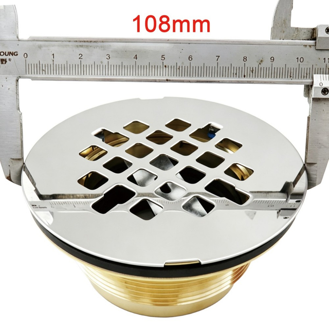 Caliper measuring 108mm top diameter on vertical outlet brass drain