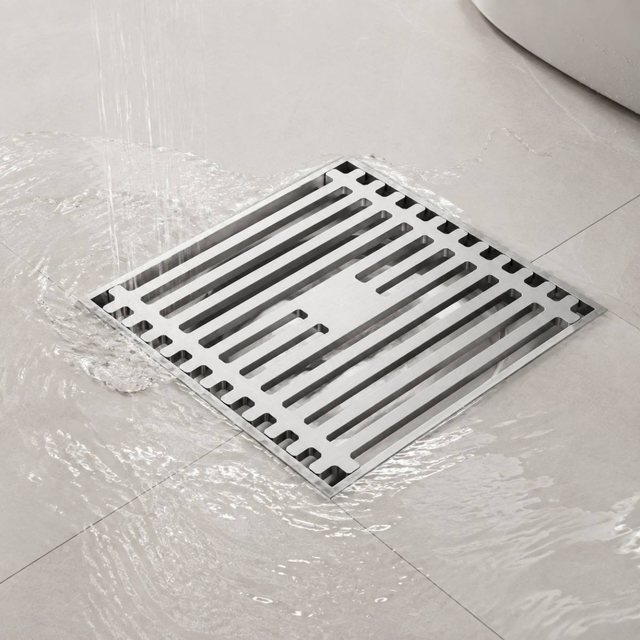 High capacity square floor drain rapidly evacuating shower water on tiles