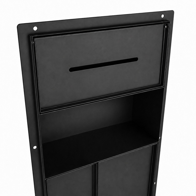 Close up detailing the smooth horizontal tissue dispensing slot on a matte black stainless steel toilet paper holder
