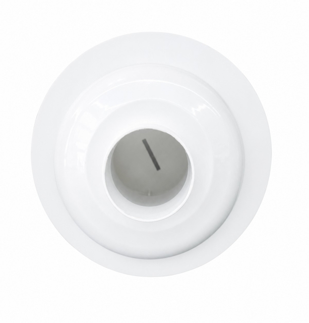 Bottom vertical connection outlet of a white PVC anti clog floor drain base